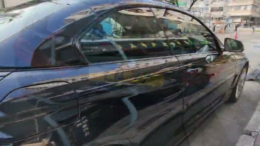 BMW 428i 車側完工後，車門同尾翼線條倒影清晰